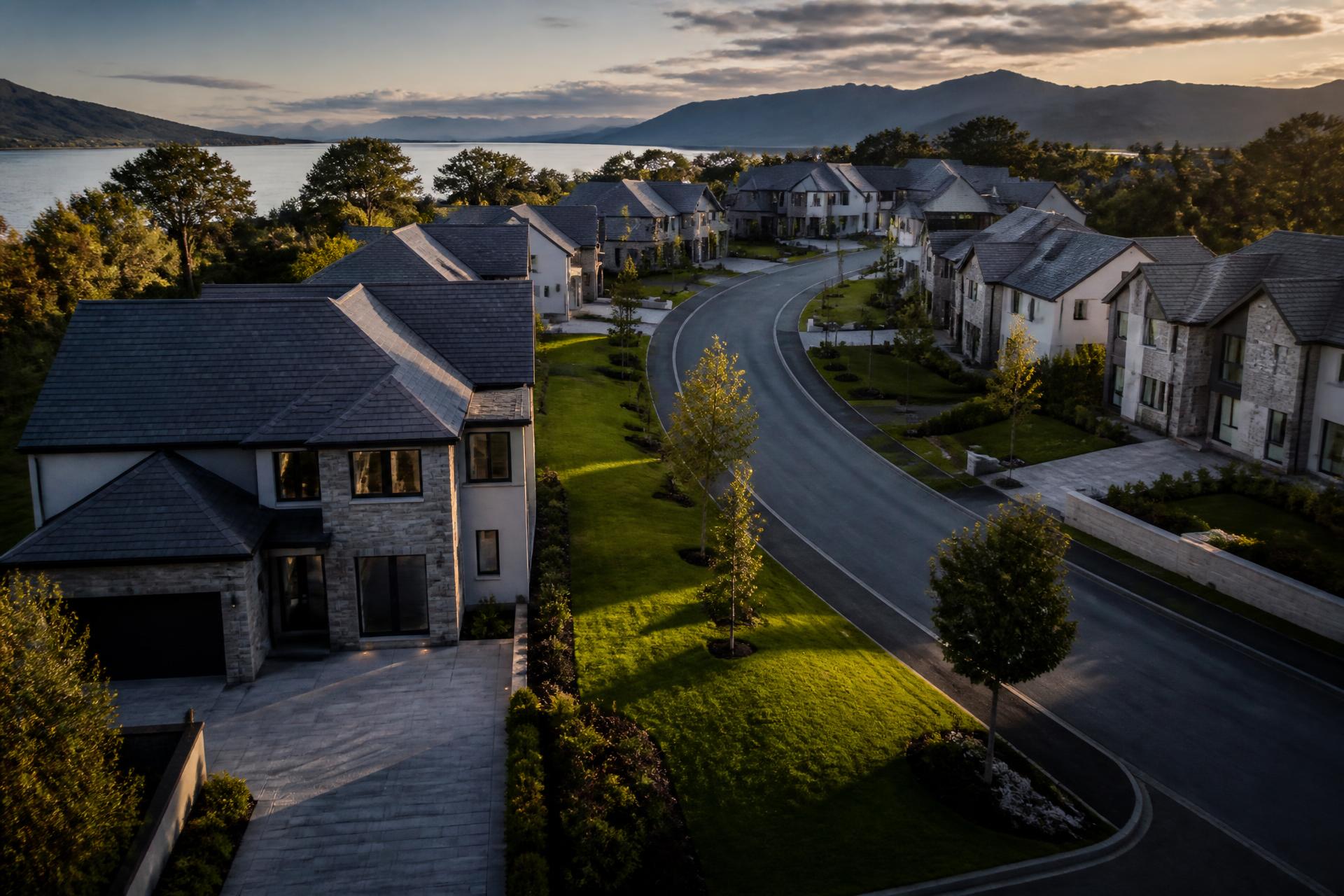 Aerial view of a premium new build housing development in Edinburgh at golden hour